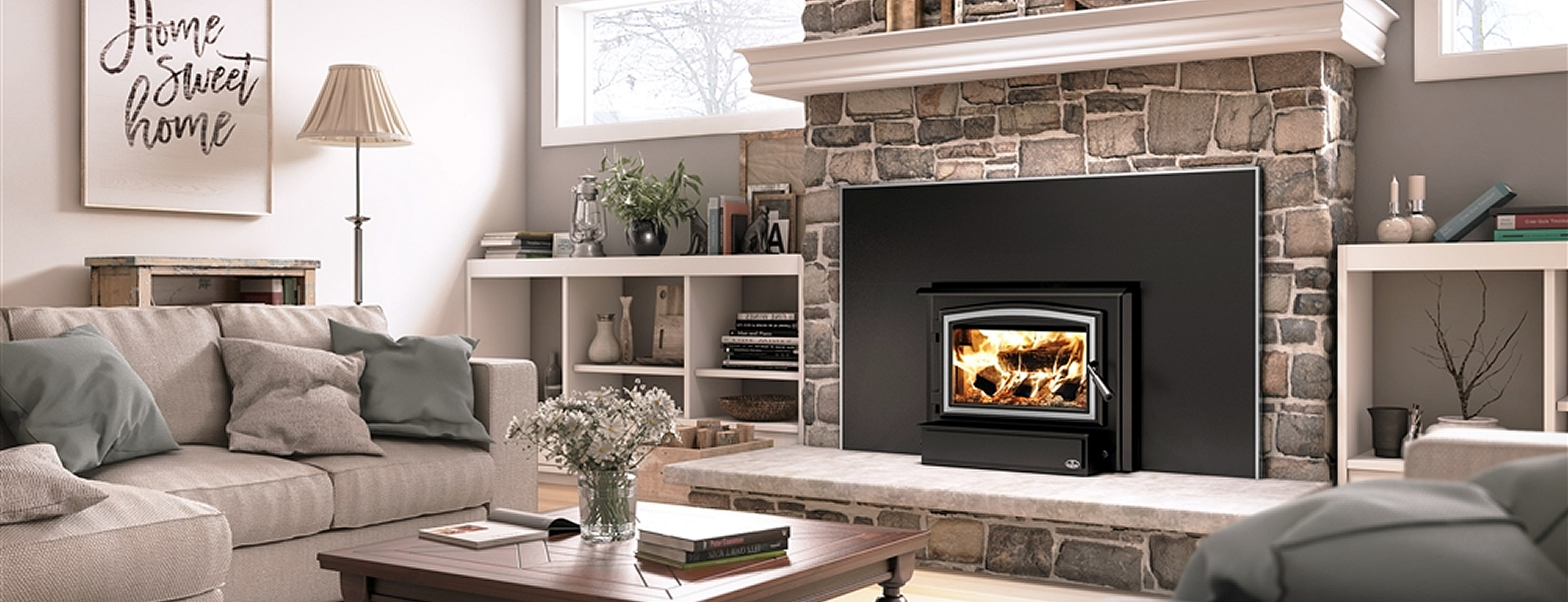 Beautiful living room with stone fireplace insert installed by New England Chimney Sweeps